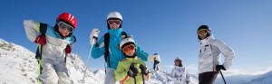 kids skiing with parents