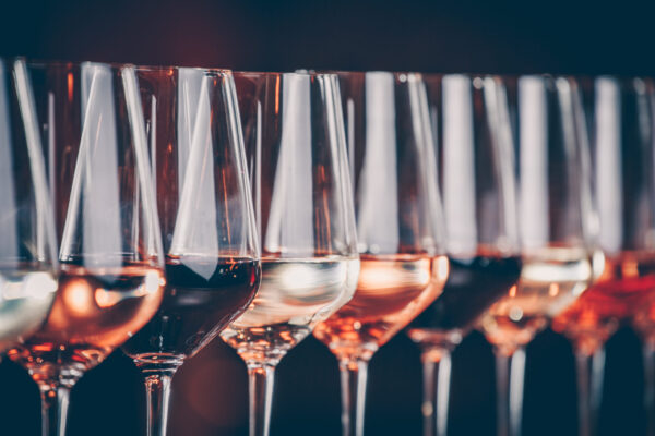 Wine glasses in a row. Buffet table celebration of wine tasting.